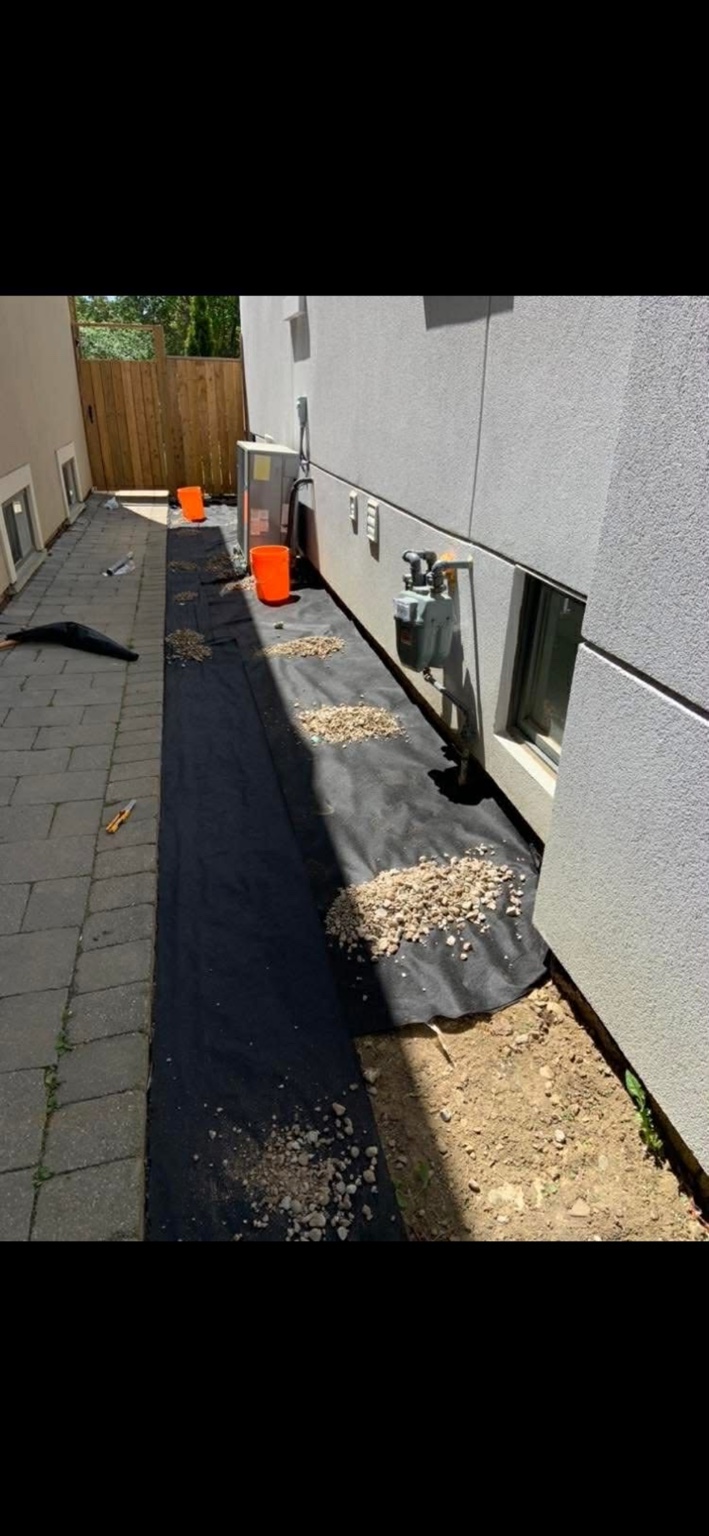 Landscape fabric and drainage stone
